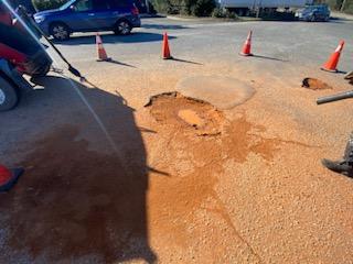 Parking Lot Pot Hole Repair Pensacola | SprayTech, LLC